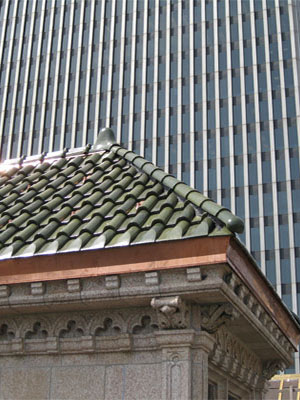 Clay tile roof and copper gutter installation at the historic monroe building